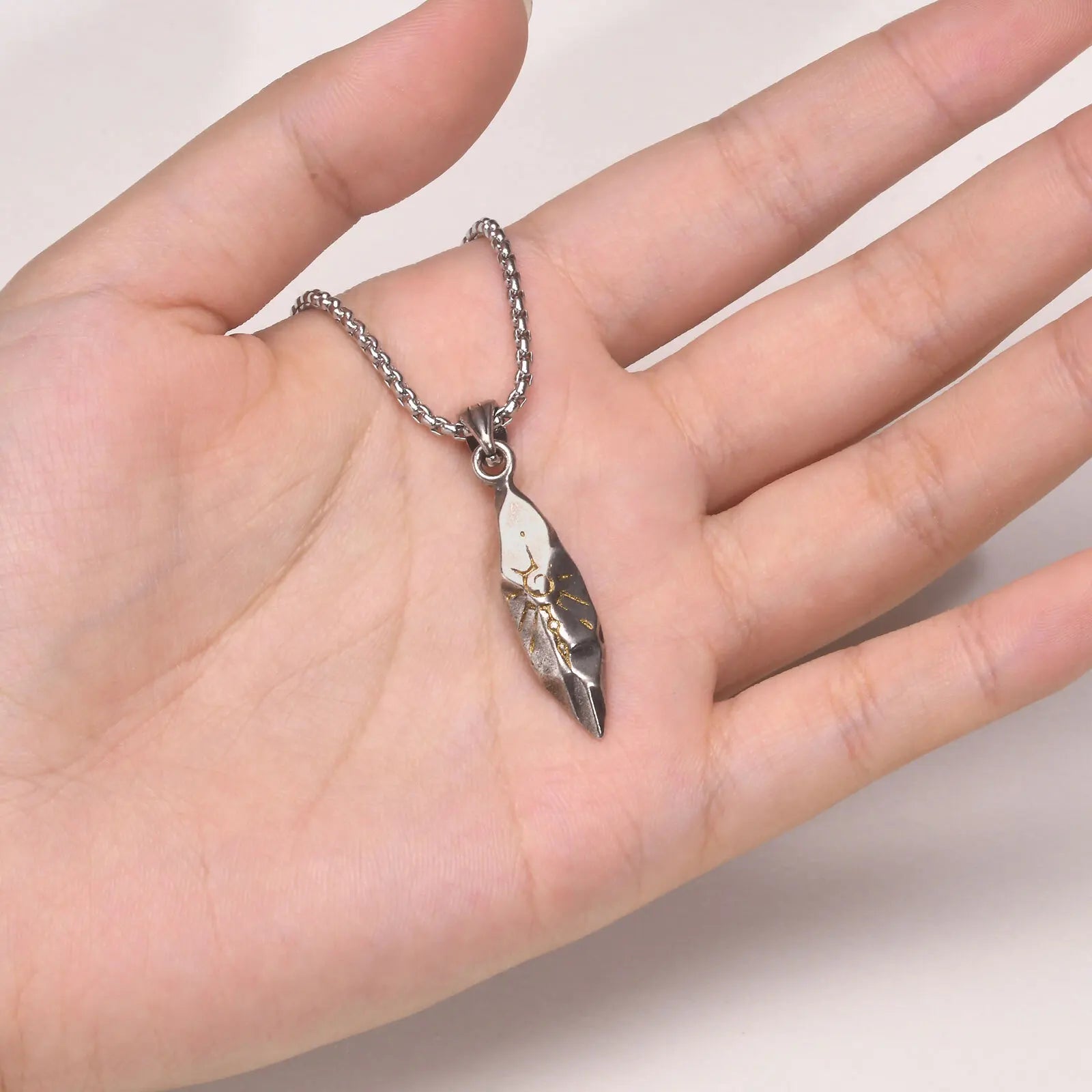 Sun-Touched Feather Pendant – Stainless Steel Wishing Stone Necklace for Men